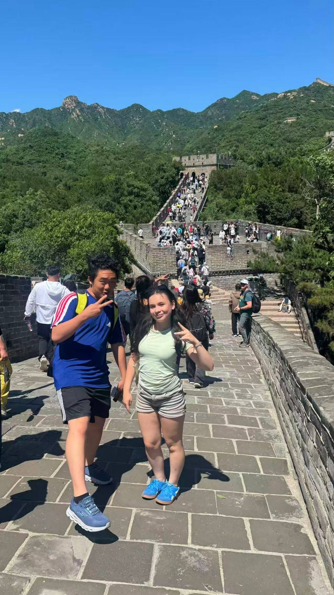 Posing on the iconic Great Wall of China